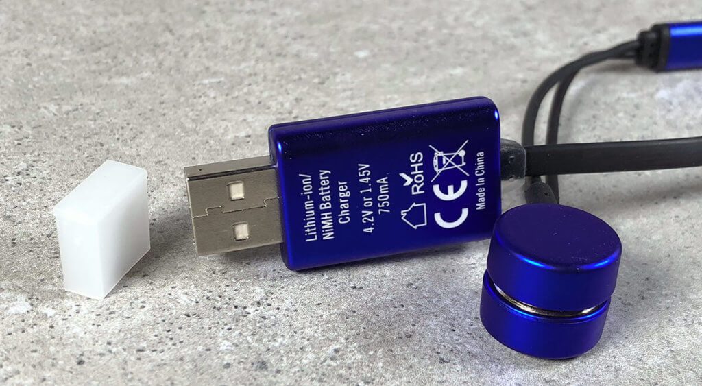 Here the plug including charging electronics and the two magnetic contact buttons.
