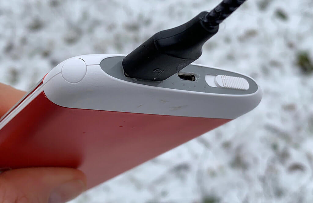 If you want to use the BigBlue pocket warmer as a power bank, you can plug in a normal USB charging cable. However, a charging cable that has an angled plug on both sides is more recommendable (has been ordered but not yet delivered).