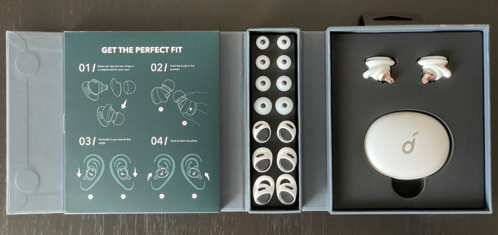 In addition to a charging case and various silicone caps and brackets, the Soundcore Liberty 3 Pro also come with extensive instructions and a charging cable (hidden behind the brief instructions on the left).